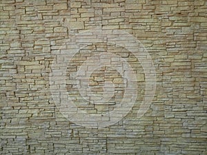 Old wall made of dense beautiful bricks with cement