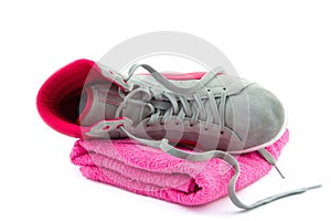 Fallen sneaker on a towel