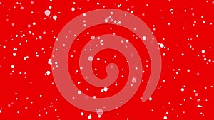 Falling abstract round snowflakes isolated on red background