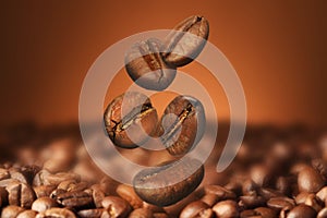 Falling aromatic roasted coffee beans, closeup view