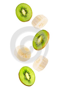 Falling banana and kiwi fruits isolated on white background