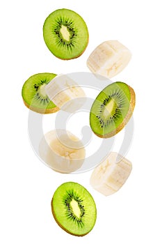 Falling banana and kiwi fruits isolated on white background