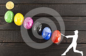 Falling bitcoin concept - baseball player hitting eggs.