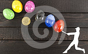 Falling bitcoin concept - baseball player hitting eggs.