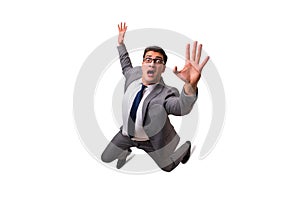 The falling businessman isolated on the white background