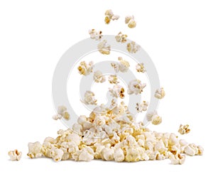 Falling cereal on a handful of popcorn isolated on a white.