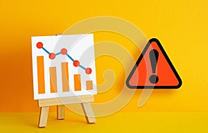 Falling chart as symbol of anxiety about reduction of finances and profits, inflation and economic instability
