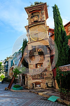 Falling Clock tower of puppet theater Rezo Gabriadze in old town of Tbilisi, Georgia