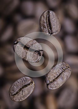 Falling coffee beans closeup