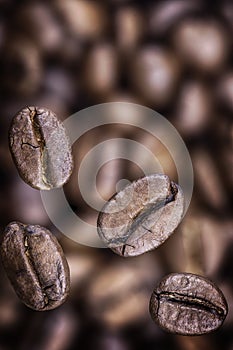 Falling coffee beans closeup