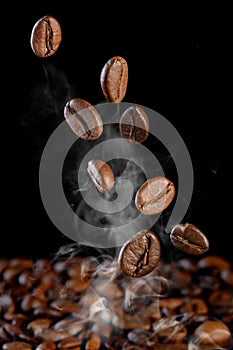 Falling coffee beans.  Coffee beans are falling down