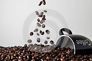 Falling coffee beans on a light background