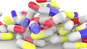 Falling colorful drug capsules or pills, shallow focus. 3D rendering