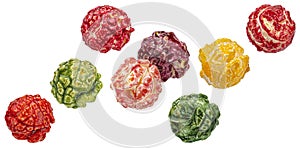 Falling colorful popcorn isolated on white background