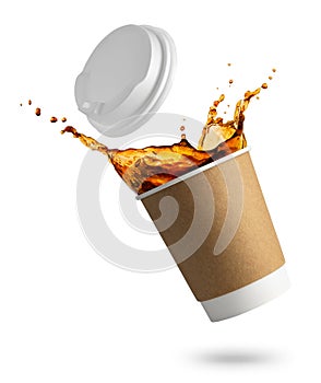 Falling disposable cup with coffee splash