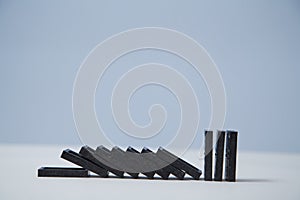 Falling domino blocks, copy space. Financial crisis. Stop total collapse. Domino effect mockup template, place for text