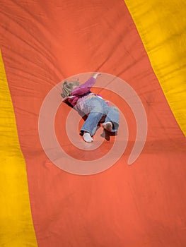 Falling down a giant slide