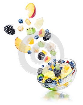 Falling fruit salad with the ingredients in the air