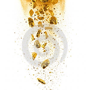 Falling gold nuggets and gold dust on white background
