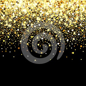 Falling golden particles on a black background.