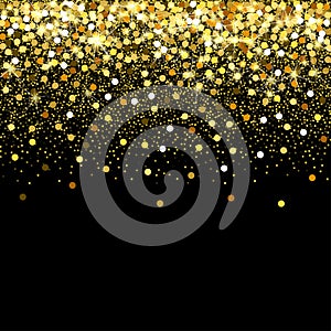 Falling golden particles on a black background. Scattered golden confetti. Rich luxury fashion backdrop. Bright shining