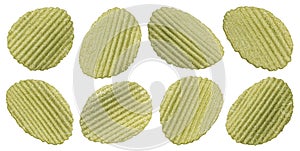 Falling green vegetable chips isolated on white background