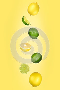 Falling lemons and limes isolated on yellow background with clipping path. Flying fruits photo