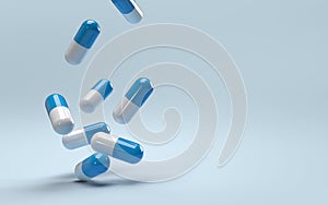Falling pills on a blue background. Antibiotics.
