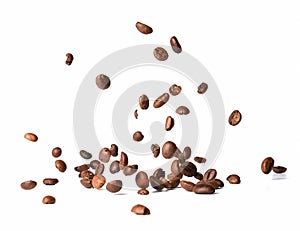 Falling roasted coffee beans. Chaotic motion. White isolated background.