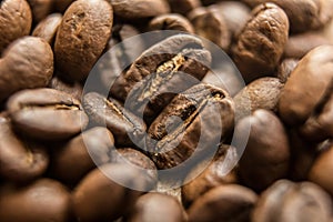 Falling Roasted Coffee Beans, Macro Shot, close-up.