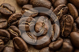 Falling Roasted Coffee Beans, Macro Shot, close-up.