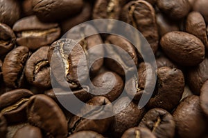 Falling Roasted Coffee Beans, Macro Shot, close-up.