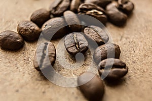 Falling Roasted Coffee Beans, Macro Shot, close-up.