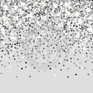 Falling silver particles on a black background. Scattered silver confetti. Rich luxury fashion backdrop. Bright shining glitter. R