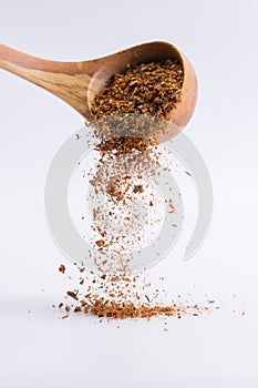 Falling spices on a white background