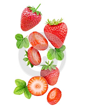 Falling strawberries isolated on white background