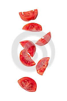 Falling tomato slice isolated on white background with clipping path.
