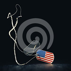 Falling US military soldier`s dog tags in the shape of the American flag with chain. Memorial Day or Veterans Day concept