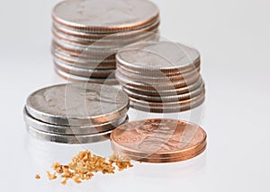 Falling value from quarters to crumbs