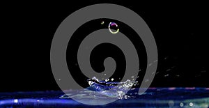 Falling water drop and splash