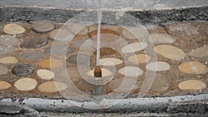 Falling water from a fountain, slow-motion shooting