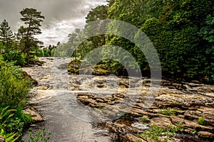 Falls of river Dochart in Loch Lomond and The Trossachs National Park, central Scotland photo