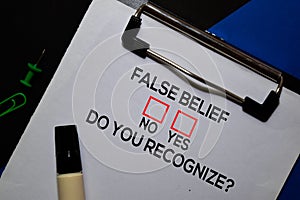 False Belief, Do You Recognize? Yes or No. On office desk background
