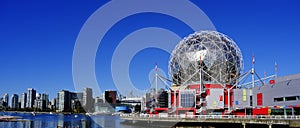 False Creek Science Center Building on Sunny Day Reflection in Water