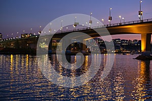 False Creek Vancouver Night Reflections. False Creek and the Cambie Street bridge at twilight in downtown Vancouver BC