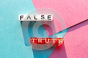 Falsity and truth confrontation on the same surface photo