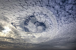 Fallstreak or Hole Punch Cloud Formation photo