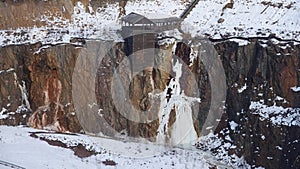 Falun copper mine pit entrance shaft in winter in Sweden