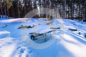 Falun - March 30, 2018: Frozen benches at Framby Udde near the town of Falun in Dalarna, Sweden