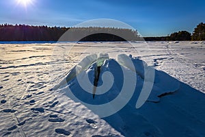 Falun - March 31, 2018: Ice formation at the frozen lake of Framby Udde near the town of Falun in Dalarna, Sweden